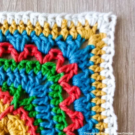 Round 12 of large 9 inch African flower crochet square completed and squared