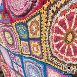 Yarn requirement to create a boho style flower patchwork crochet blanket