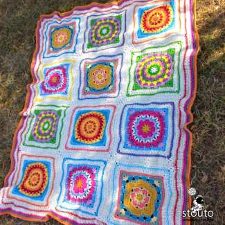 Crochet lapghan made from pretty flower squares