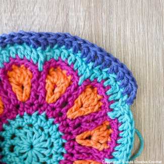 Center stage large flower crochet square pattern round 12