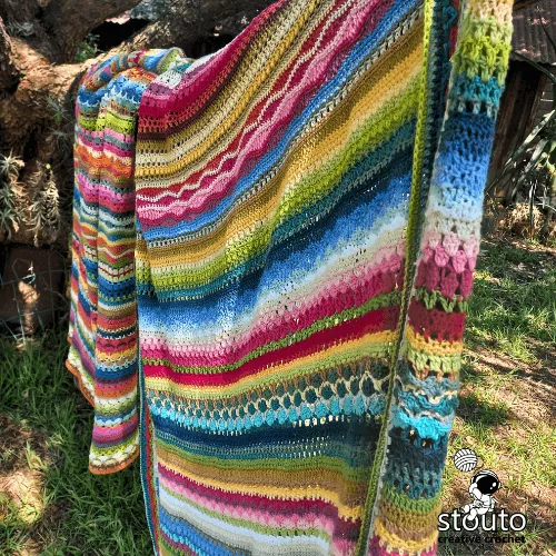 Close up of textured crochet stitch sampler blanket rows