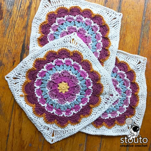Early Blossom crochet flower granny square pattern featuring a large floral afghan square worked in the round.