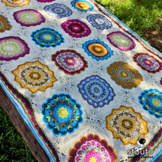Large flower granny square crochet blanket pattern with textured petals