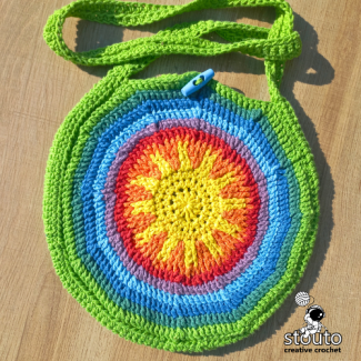 Sunshine Rainbow Round Crochet Tote Bag laid flat showing front and strap construction