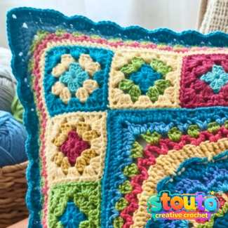 Crochet pillow square layout showing flower squares joined around a central floral square