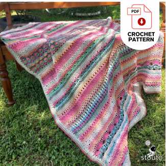 Flower stitch sampler crochet blanket pattern with written instructions and stitch diagrams.