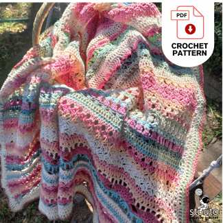 Crochet blanket pattern materials list, yarn requirements, hook size, and blanket information.