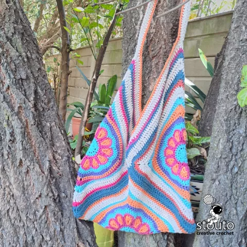 Large slouch crochet bag made with large crochet flowers
