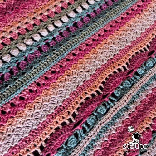  Crochet blanket using stitches that work up fast with decorative floral texture