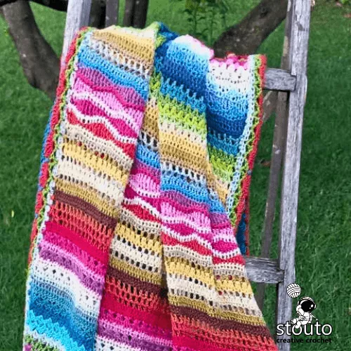 Free crochet stitch sampler blanket featuring multiple textured stitches