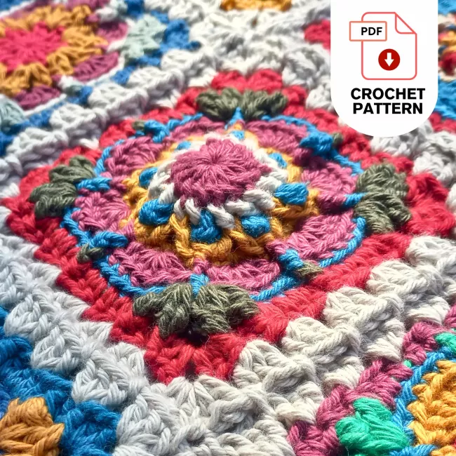 Crochet flower square in progress showing round by round construction