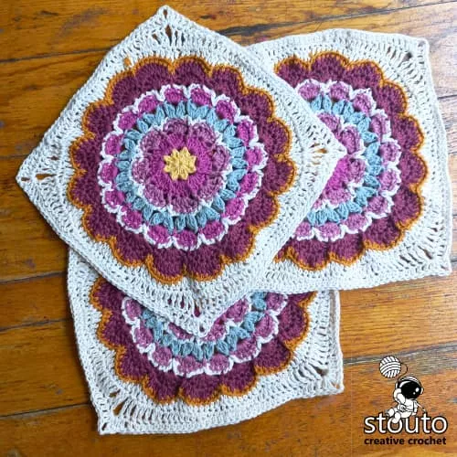 Crochet flower afghan square pattern with textured petals and bonus floral blanket border included.